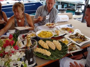 Judges sampling the cuisine onboard Pacific Wave at the Antigua Yacht Show