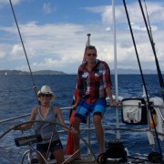 Honeymoon couple onboard Pacific Wave sailing down the Sir Francis Drake Channel BVI