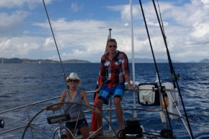 Honeymoon couple onboard Pacific Wave sailing down the Sir Francis Drake Channel BVI