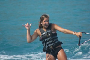 Kids waterskiing from SY Pacific Wave