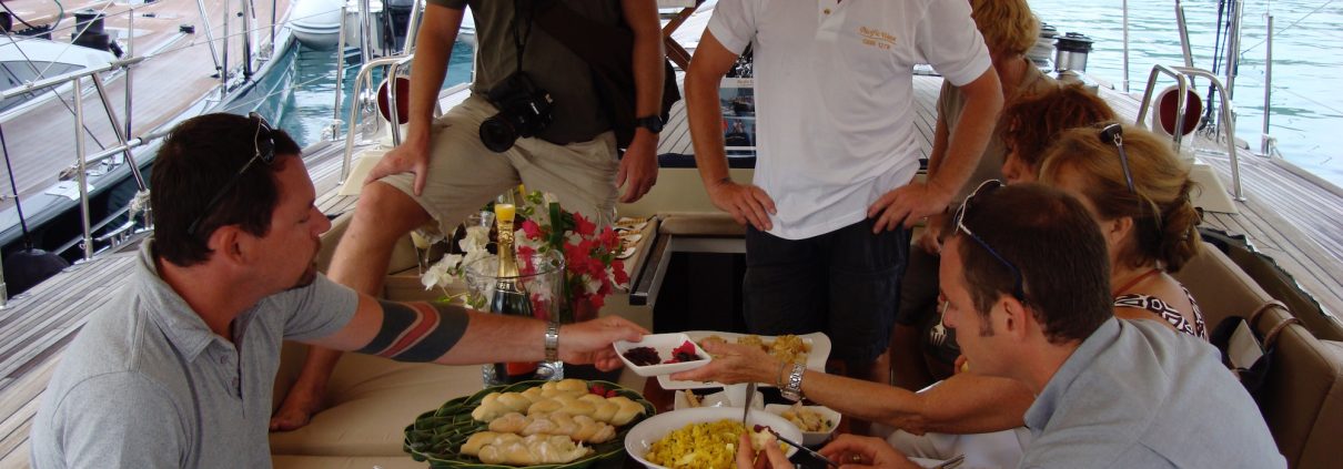 Judges and Photographer Interviewing Mark Miles at the Antigua Charter Yacht Show
