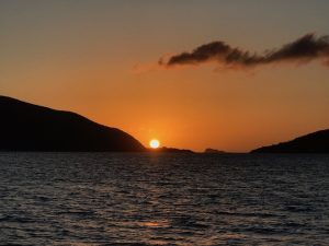 Sunset from Pacific Wave on a BVI Crewed Yacht Charter